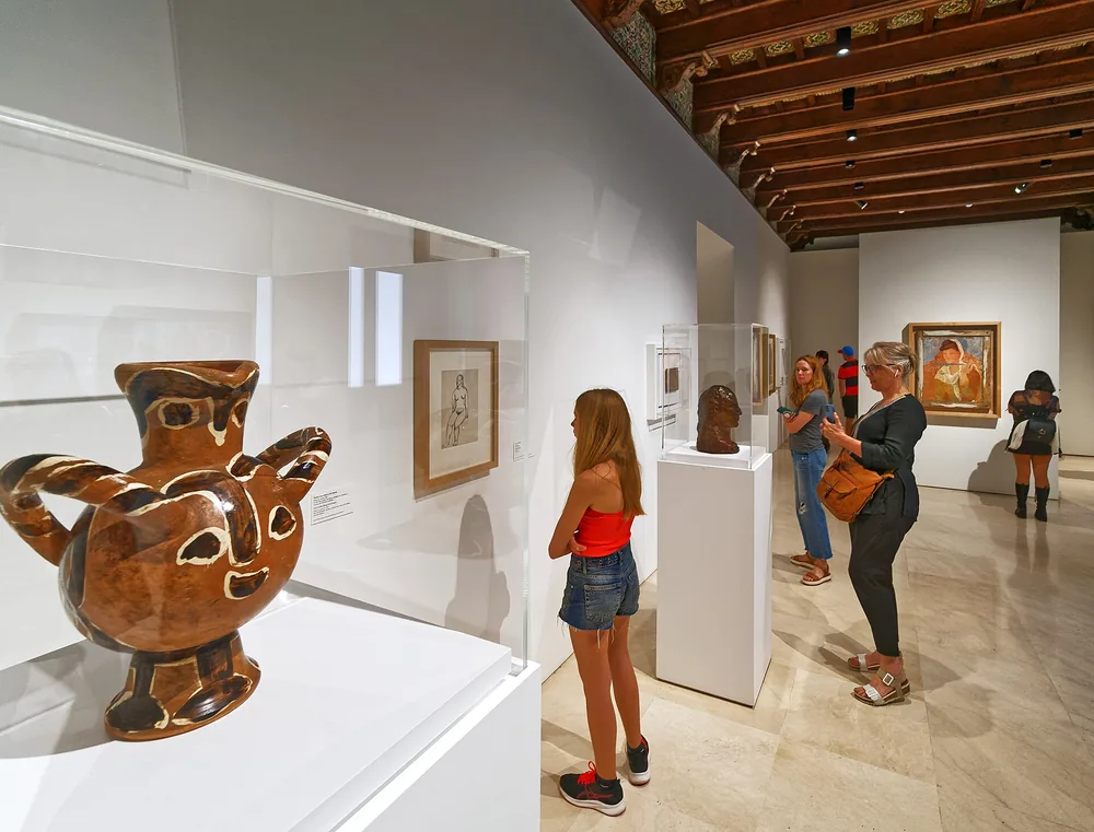 Gallery at the Museo Picasso Málaga with a Picasso ceramic