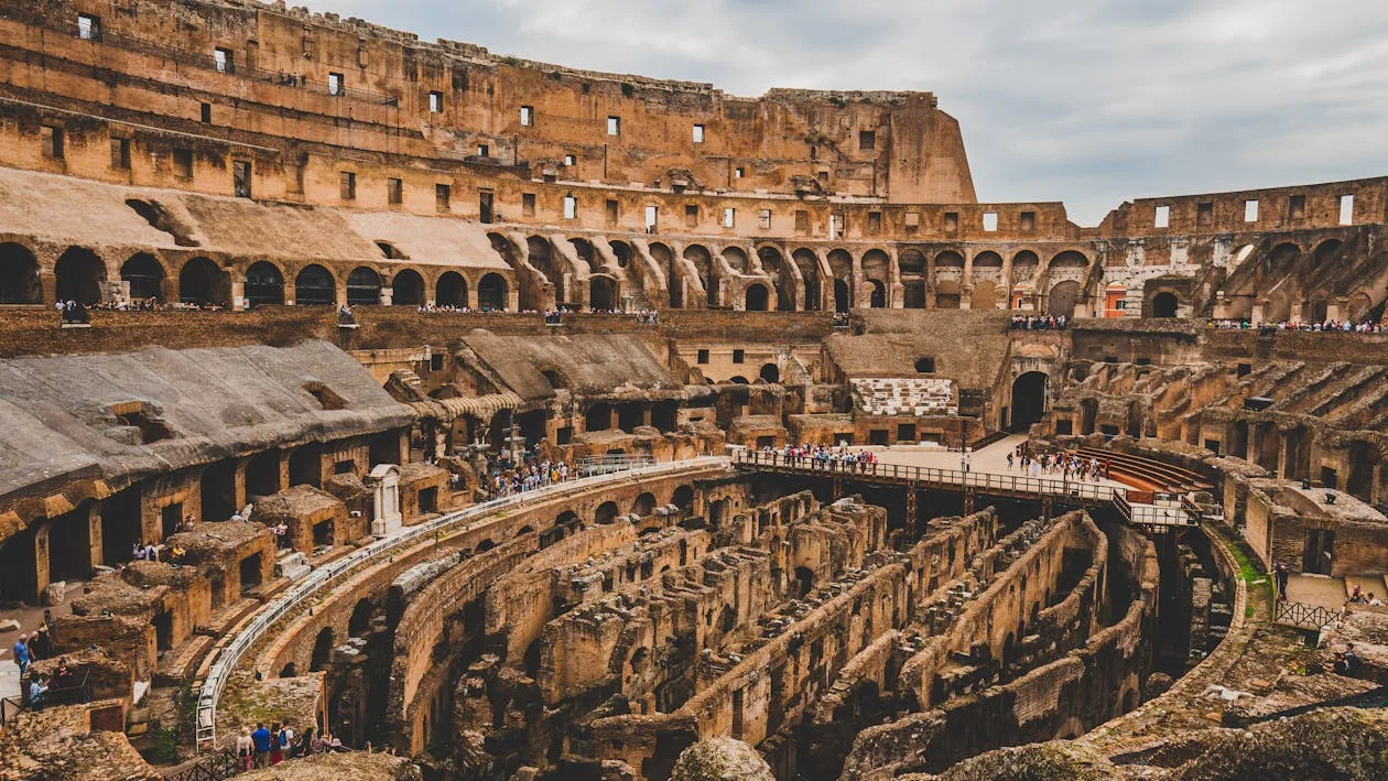 Colosseum interior — the arena floor and hypogeum visible from the upper tiers